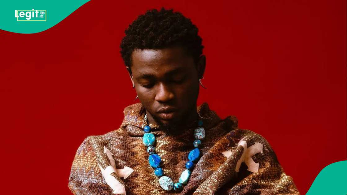 Omah Lay responds after being called gay for sharing his unclad pictures online.