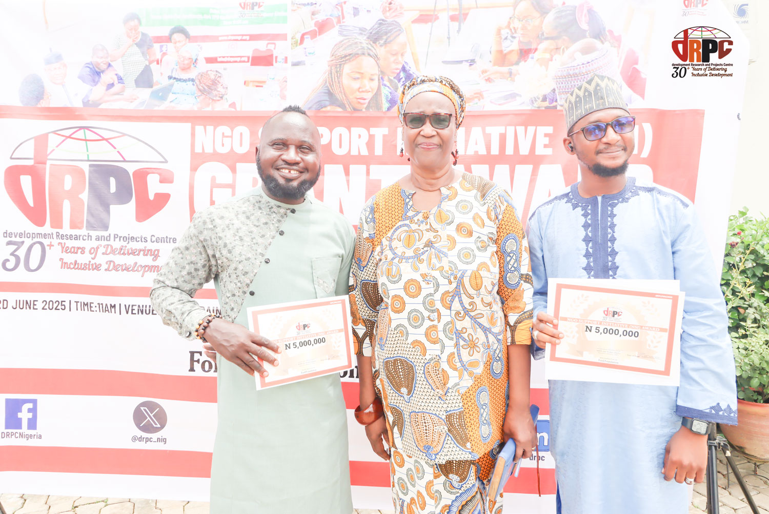From Left: Mr Barnabas Henry, Rahma Women Development Programme, Bauchi, one of the winners, Dr Judith-Ann Walker, ED, dRPC and Mr Umar Isah of the Federation of Muslim Women Association of Nigeria, Niger State branch, during the handover of cheques to the winners in the dRPC Abuja office.