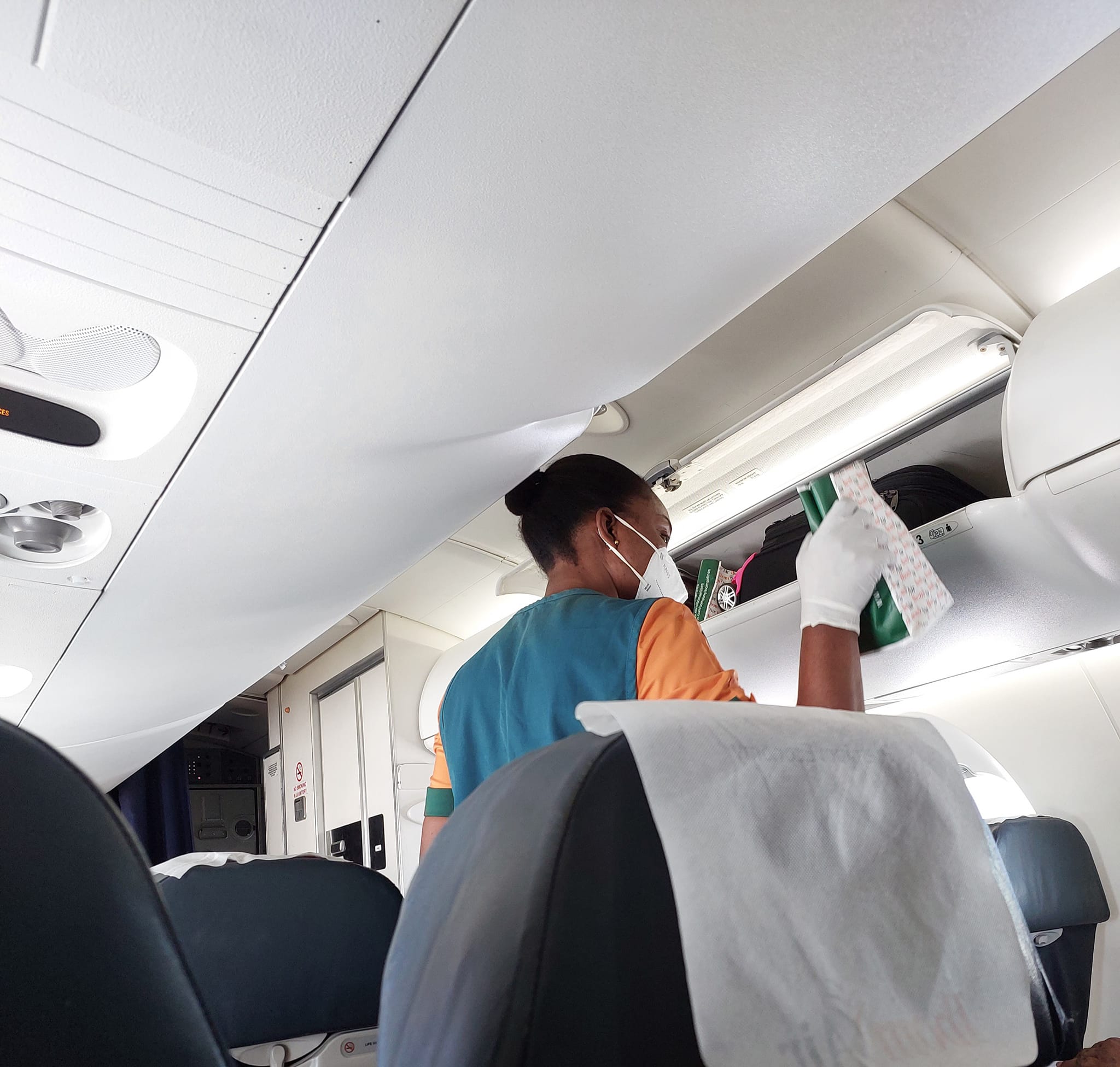 Ibom Air flight attendant on duty on board an aircraft Photo credit_ Sucex Bright