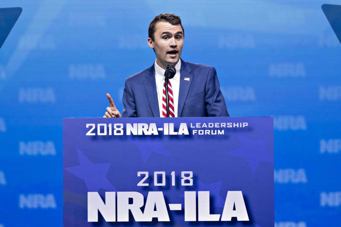 Charlie Kirk speaks on stage